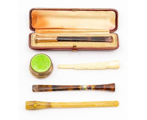 A 9ct gold capped pipe with original box, a miniature green enamelled silver pill box, a collection of further pipes, includi