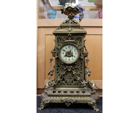 A Victorian style brass cased eight day mantle clock, in the Rococo Revival styleC R: size of dial 9.5cm dia, height of clock