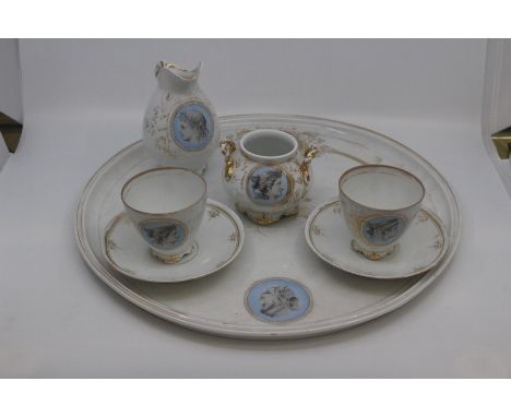 A Paris porcelain part cabaret tea set, circa 1890, decorated with neoclassical cameo portraits of Helen and Paris within gil