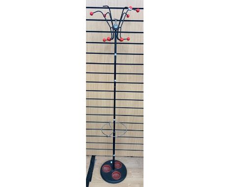 A mid-20th century, modernist, six branch hat and stick stand with three stick inserts, approx. 170cm height.