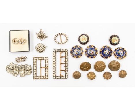Two late Georgian buckles both set with white paste stones along&nbsp; with a&nbsp; collection of French gilt metal and ename