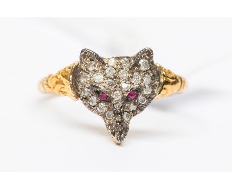 A diamond set silver and 18ct gold fox ring, the head pave set with diamonds and red spinel set eyes, setting approx. 11 x 15