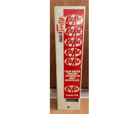 A vintage Kit Kat Vending Machine, 2x 10p insert, measuring approx. 9" x 36" x 6".