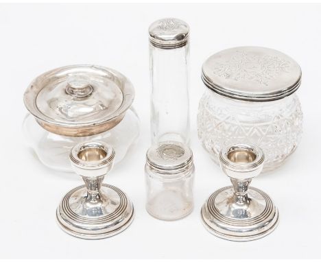 A collection of silver dressing table items comprising: a Victorian silver mounted jar, London, 1853; a powder jar, pair of s