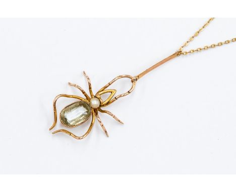 An Edwardian spider pendant, the body set with an oval aquamarine, pearl set head, length of the pendant drop approx. 40mm, t