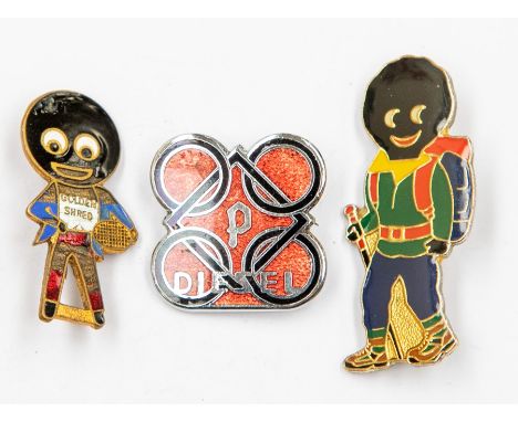 Two enamel Golly brooches and a diesel pin (3)