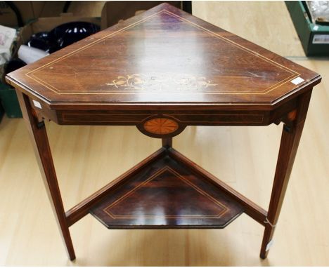 An early 19th Century mahogany fold-over tea table, raised on turned supports, 73cm high, 92cm wide, 46cm deep, together with