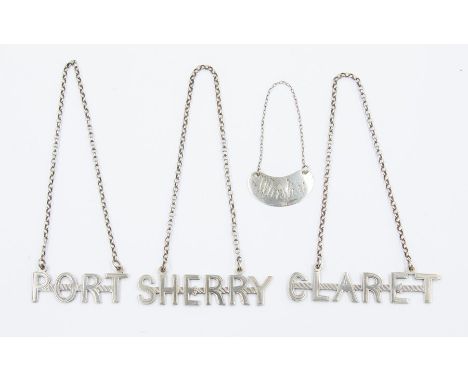 A late Victorian decanter set of three sterling silver Arts &amp; Crafts labels, comprising sherry, port, claret, London 1897