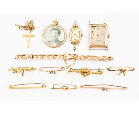 A collection of 9ct gold to include brooches, two set with stones some with base metal pins, along with a 9ct gold cross and 