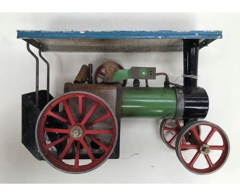 An early 20th Century model of a steam roller, made by Mamod. In need of restoration.