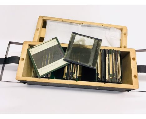 Collection of 38 magic lantern slides, to include three of the Panama Canal (one showing a family outside building); one depi