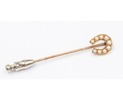 An Edwardian pearl set stick pin in the form of a horse shoe, 18ct and 9ct gold, total gross weight approx. 3gms&nbsp;