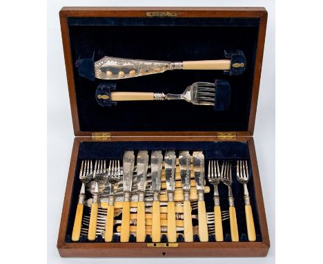 A collection of silver plated flatware including a canteen of plated cutlery in a mahogany case, a Georgian caddy spoon, a ra