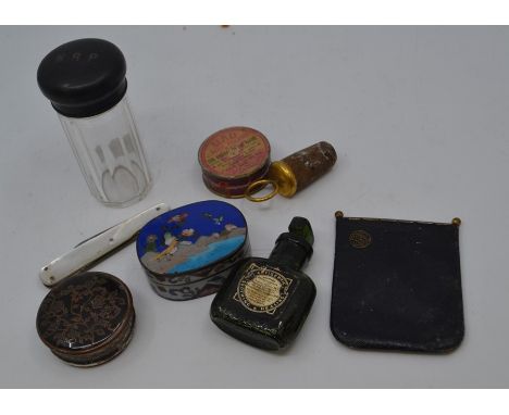 A collector's lot including: a Cloisonné pill box the cover with birds by water; a white metal tortoiseshell mounted circular