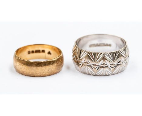 Two 9ct gold rings to include a 9ct white gold diamond cut band width approx. 8mm, size O1/2 along with a 9ct gold band appro