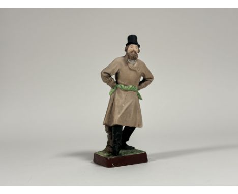 Gardener Porcelain Factory of Moscow, a coloured biscuit porcelain figure of a dancing peasant in hat and green sash, late 19