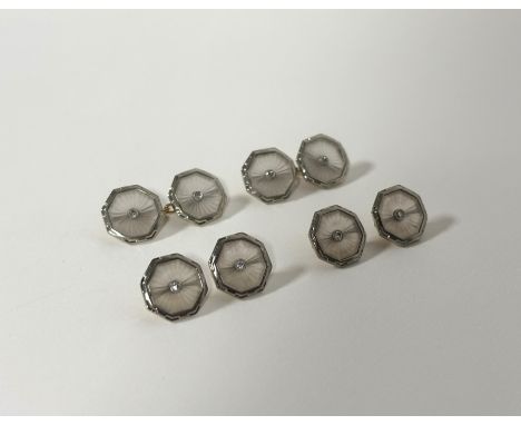 A suite of gentleman's 18ct gold diamond-set dress studs and cufflinks, in the Art Deco taste, c. 1930, the chainlink cufflin