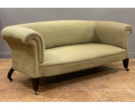 An Irish Chesterfield sofa, third quarter of the 19th century, well upholstered in sage green cotton and raised on ebonised s