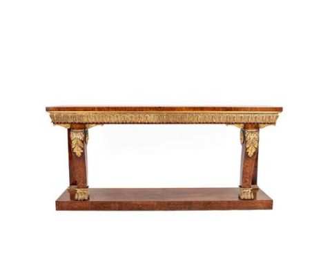 A Victorian Brown Oak and Parcel Gilt Console Table, in the manner of William Kent, mid 19th century, the rectangular top abo