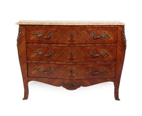 A French Louis XV Style Tulipwood and Floral Marquetry Serpentine Shaped Commode, 20th century, the yellow marble top above t