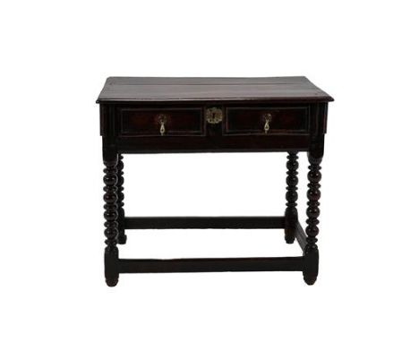 A Late 17th Century Oak Side Table, the moulded top above a two-as-one moulded drawer, on bobbin turned legs joined by a peri