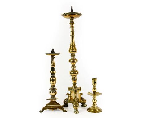 A Brass Altar Pricket Candlestick, in 17th century style, with circular drip pan on multiple knopped baluster stem and tricor