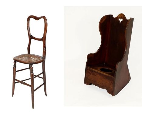 A Victorian Stained Pine Child's Rocking/Commode Chair, mid 19th century, with heart shaped pierced carrying handle and flare