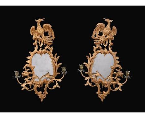 A Pair of George III Carved Giltwood Girandoles, 3rd quarter 18th century, regilded and with later mirror plates and nozzles,