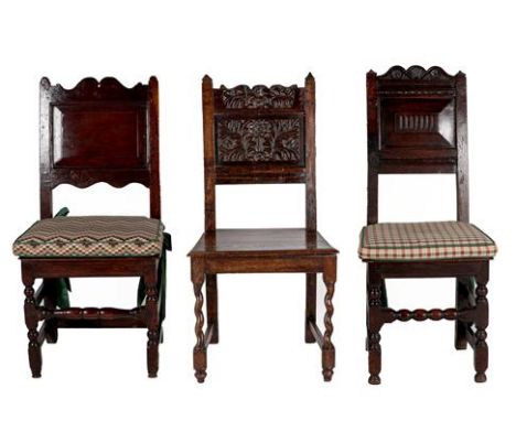 A Joined Oak Back Stool, circa 1700, the carved top rail above a moulded and gadrooned back panel, with nailed and boarded se
