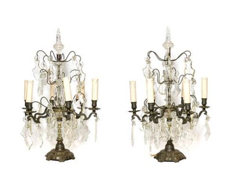 A Pair of French Brass-Mounted Metal Six-Light Candelabra, in Louis XV style, with minaret finials and baluster stems, the sc