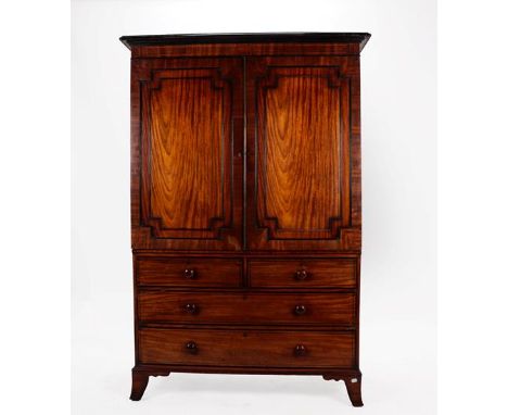A Regency Mahogany, Ebony and Boxwood Strung Linen Press, early 19th century, the moulded cornice above two moulded cupboard 