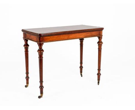 A Victorian Walnut and Gilt Metal Mounted Foldover Card Table, late 19th century, the moulded top enclosing a modern baize li