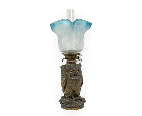 A Craighead &amp; Cintz Patinated Metal Oil Lamp, late 19th century, naturalistically cast as a seated owl with glass eyes, o