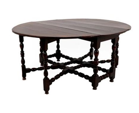 A Good Late 17th Century Six-to-Eight-Seater Double Gateleg Table, with two rounded drop leaves to form an oval, on turned an