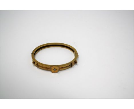An Edwardian 18ct gold and diamond hinged bangle, 