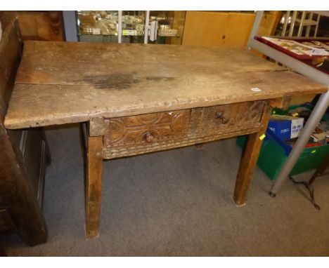 A antique rustic Spanish console table, possibly 17th century, the rectangular top with two deep drawers, on square supports,