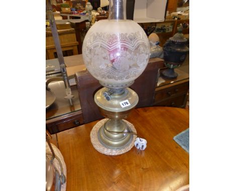 A Duplex oil lamp conversion, with etched glass shade, converted to electric.