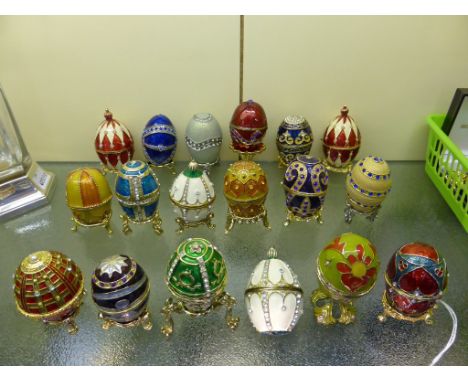 A collection of eighteen Faberge style enamel Easter eggs.