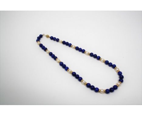A cultured pearl, lapis lazuli and 18ct gold necklace, 