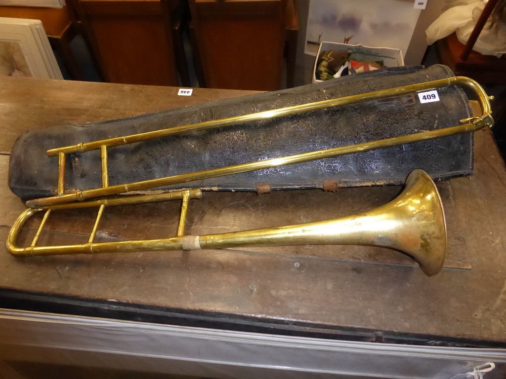 An antique bass trombone, maker possibly Antoine Courtois & Mille