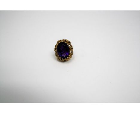 A 9ct gold and amethyst ring, 