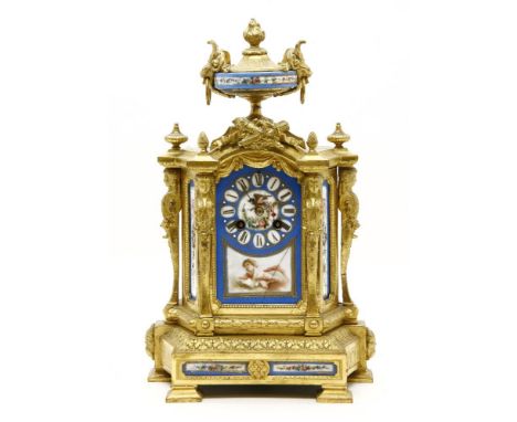 A gilt metal and porcelain mounted mantel clock, with damaged dial38.5cm high