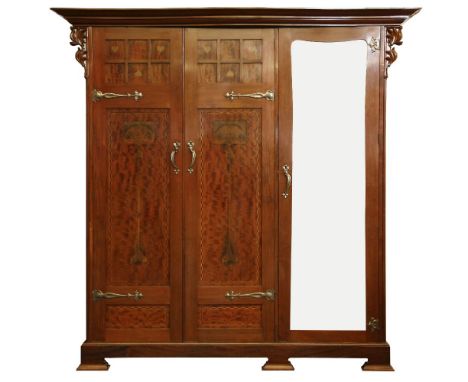 A Maple & Co Art Nouveau inlaid mahogany triple wardrobe, the moulded cornice above pair of panel doors and mirrored door enc