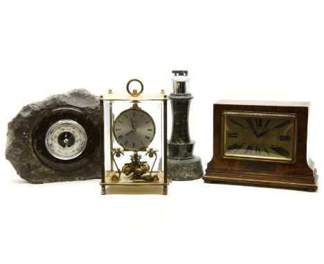 A Kudo brass 400 day mantel clock, walnut cased mantel clock, rock barometer and lighthouse lighter, 24cm tall