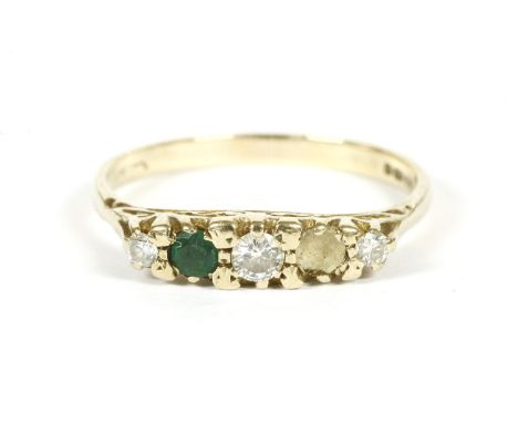 A 9ct gold five stone graduated diamond and emerald ring boat shaped ring, one emerald deficient, 2.09g