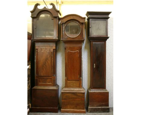 Three mahogany longcase clock cases, some fire damage, one with 30 hour movement, tallest 222cm