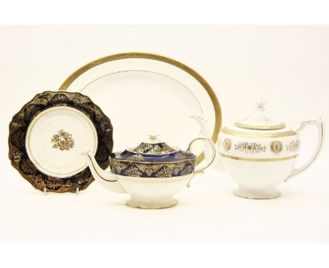An extensive Minton bone china part-dinner service, in the 'Buckingham' pattern including:38 dinner plates, 21 dessert plates