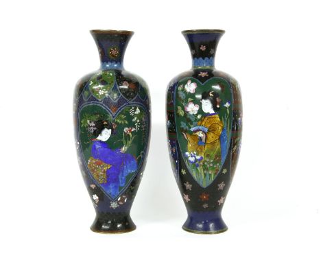 Two Japanese cloisonné vases, each with a heart shaped panel of a geisha and butterflies and flowers. 41cm high. Some damages