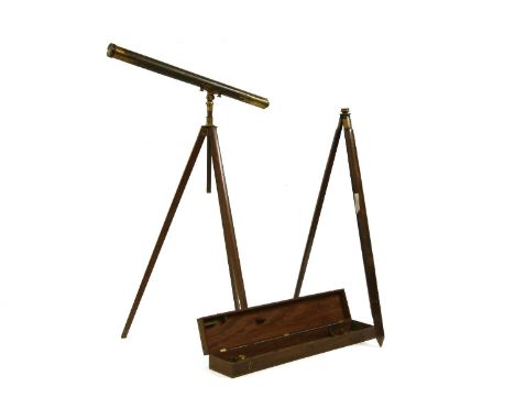 A 19th century Dolland lacquered brass telescope, 109cm long, together with numerous additional lenses all in a fitted mahoga