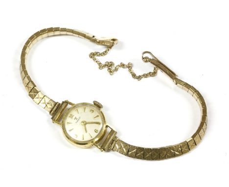 A ladies 18ct gold Tissot mechanical strap watch, silvered dial, Arabic and baton numerals, and later 9ct gold bracelet, case